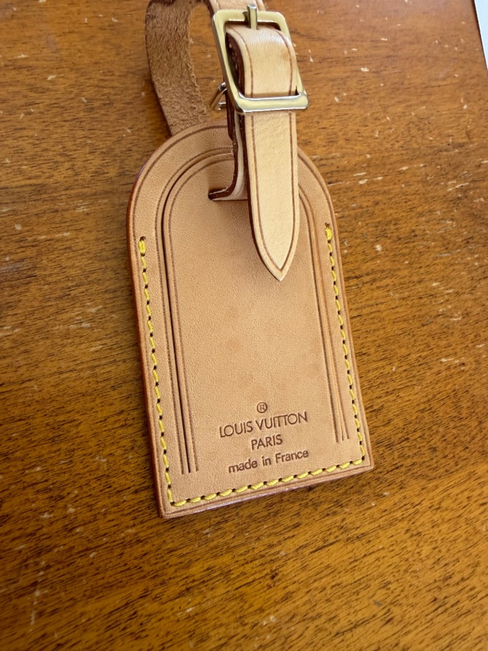 Louis Vuitton Vachetta leather luggage tag often referred to as a name tag